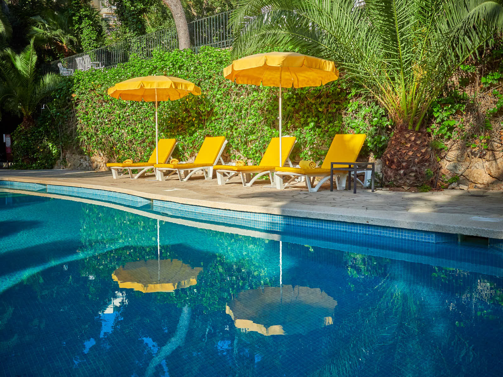 Spa pool with yellow parasols